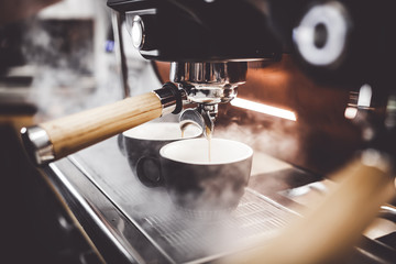 Photo of coffee being made at an espresso machine